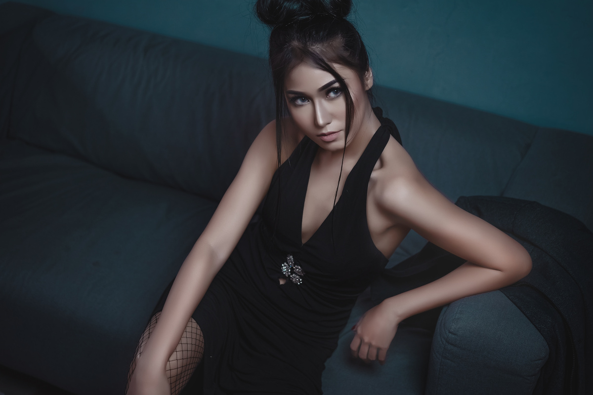 Photo of Woman Wearing Black Dress